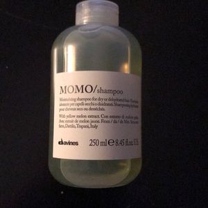 MOMO shampoo, 8.45 oz, by davines. Never used.